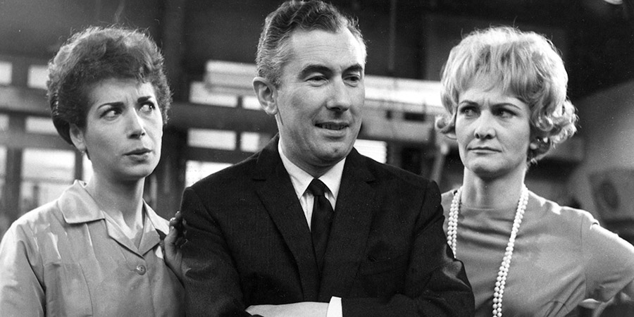 The Rag Trade. Image shows from L to R: Paddy Fleming (Miriam Karlin), Harold Fenner (Peter Jones), Carole Taylor (Sheila Hancock). Copyright: BBC. The Rag Trade. Image shows from L to R: Paddy Fleming (Miriam Karlin), Harold Fenner (Peter Jones), Carole Taylor (Sheila Hancock). Copyright: BBC.
