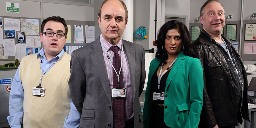 The Wright Way. Image shows from L to R: Clive Beeches (Luke Gell), Gerald Wright (David Haig), Malika Maha (Mina Anwar), Bernard Stanning (Toby Longworth). Copyright: Phil McIntyre Entertainment. The Wright Way. Image shows from L to R: Clive Beeches (Luke Gell), Gerald Wright (David Haig), Malika Maha (Mina Anwar), Bernard Stanning (Toby Longworth). Copyright: Phil McIntyre Entertainment.