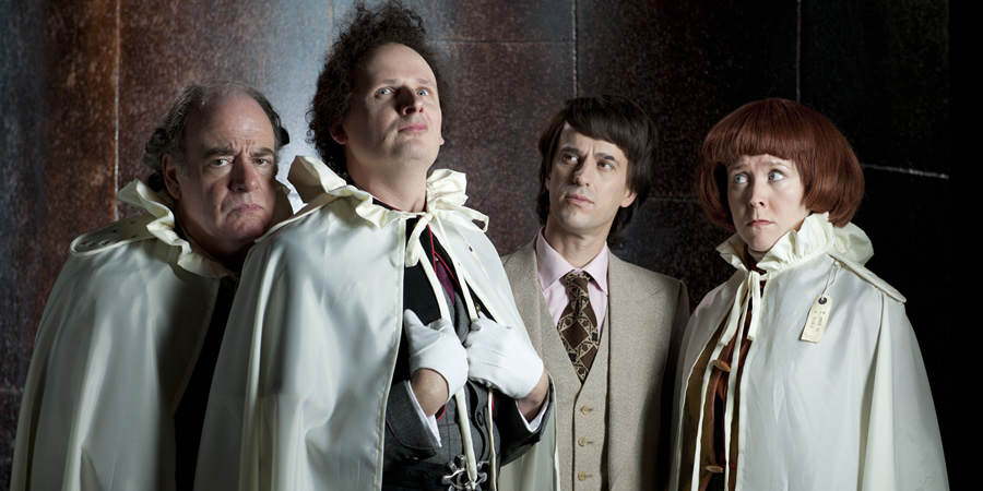 This Is Jinsy. Image shows from L to R: Trince (Geoffrey McGivern), Maven (Justin Chubb), Sporall (Chris Bran), Soosan Noop (Alice Lowe). Copyright: The Welded Tandem Picture Company. This Is Jinsy. Image shows from L to R: Trince (Geoffrey McGivern), Maven (Justin Chubb), Sporall (Chris Bran), Soosan Noop (Alice Lowe). Copyright: The Welded Tandem Picture Company.