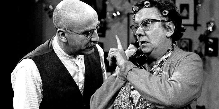Till Death Us Do Part. Image shows from L to R: Alf Garnett (Warren Mitchell), Else Garnett (Dandy Nichols). Copyright: BBC. Till Death Us Do Part. Image shows from L to R: Alf Garnett (Warren Mitchell), Else Garnett (Dandy Nichols). Copyright: BBC.
