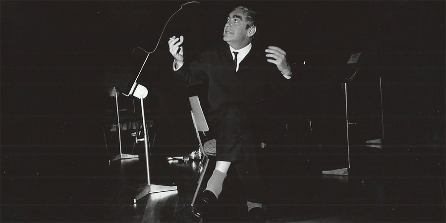 Tony Hancock seated on stage at the Royal Festival Hall. Photograph courtesy of THAS archive. Tony Hancock. Copyright: BBC. Tony Hancock seated on stage at the Royal Festival Hall. Photograph courtesy of THAS archive. Tony Hancock. Copyright: BBC.
