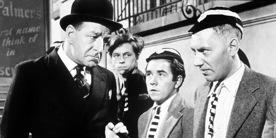 Top Of The Form. Image shows from L to R: Professor Fortescue (Ronald Shiner), Unknown, Aloof Student (Ronnie Corbett), Arty Jones (Alfie Bass). Copyright: Rank Organisation. Top Of The Form. Image shows from L to R: Professor Fortescue (Ronald Shiner), Unknown, Aloof Student (Ronnie Corbett), Arty Jones (Alfie Bass). Copyright: Rank Organisation.