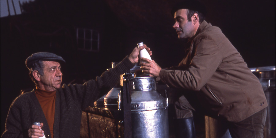 Two In Clover. Image shows from L to R: Sid Turner (Sid James), Vic Evans (Victor Spinetti). Copyright: Thames Television. Two In Clover. Image shows from L to R: Sid Turner (Sid James), Vic Evans (Victor Spinetti). Copyright: Thames Television.