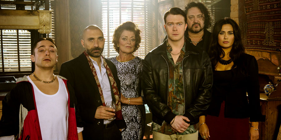 Undercover. Image shows from L to R: Stepan (Ryan Sampson), Ara (Sacha Alexander), Lucine (Bernice Stegers), Chris (Daniel Rigby), Garabed (Ivan Kaye), Lara (Yasmine Akram). Copyright: Bonafide Films / Baby Cow Productions. Undercover. Image shows from L to R: Stepan (Ryan Sampson), Ara (Sacha Alexander), Lucine (Bernice Stegers), Chris (Daniel Rigby), Garabed (Ivan Kaye), Lara (Yasmine Akram). Copyright: Bonafide Films / Baby Cow Productions.