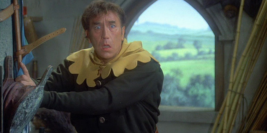 Up The Chastity Belt. Lurkalot (Frankie Howerd). Copyright: Anglo-EMI / Associated London Films Limited. Up The Chastity Belt. Lurkalot (Frankie Howerd). Copyright: Anglo-EMI / Associated London Films Limited.