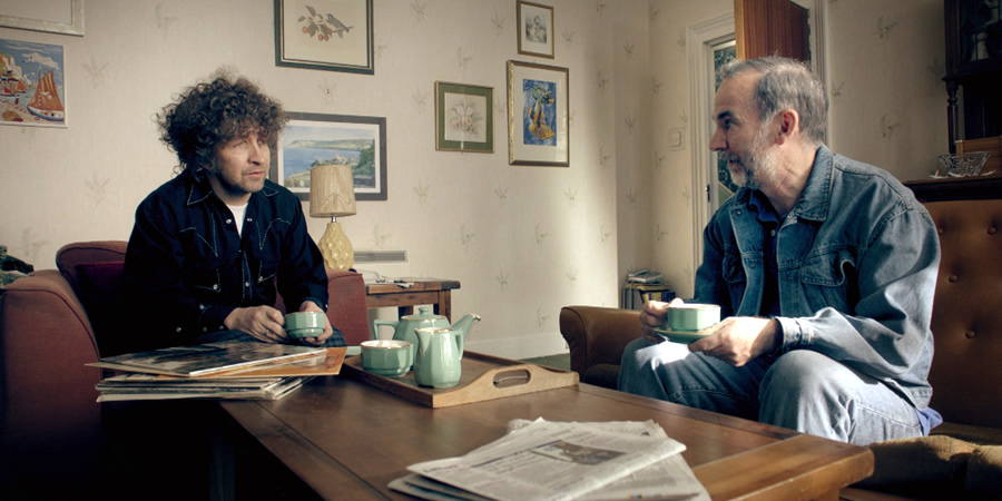 Urban Myths: Bob Dylan: Knockin' On Dave's Door. Image shows from L to R: Bob Dylan (Eddie Marsan), Dave (Paul Ritter). Urban Myths: Bob Dylan: Knockin' On Dave's Door. Image shows from L to R: Bob Dylan (Eddie Marsan), Dave (Paul Ritter).