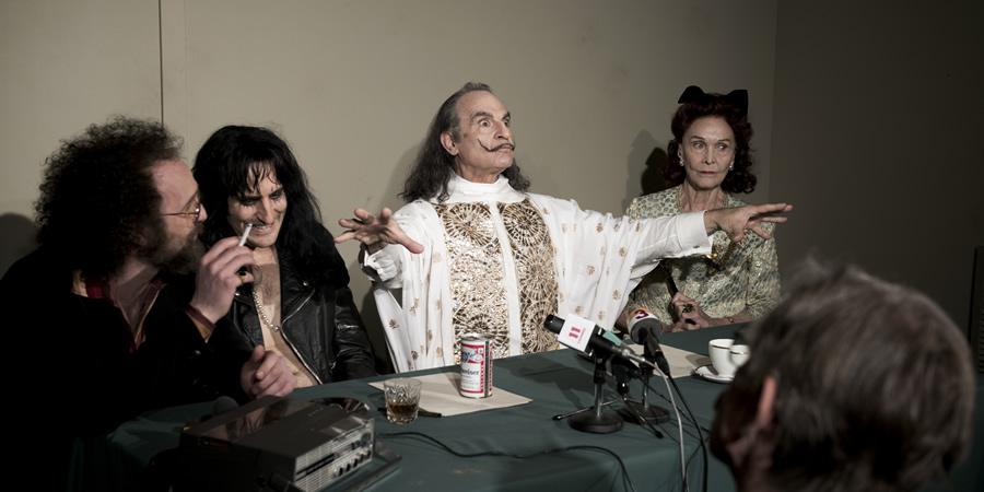 Urban Myths: The Dali And The Cooper. Image shows from L to R: Shep Gordon (Paul Kaye), Alice Cooper (Noel Fielding), Salvador Dali (David Suchet), Gala Dali (Sheila Hancock). Copyright: Me & You Productions. Urban Myths: The Dali And The Cooper. Image shows from L to R: Shep Gordon (Paul Kaye), Alice Cooper (Noel Fielding), Salvador Dali (David Suchet), Gala Dali (Sheila Hancock). Copyright: Me & You Productions.