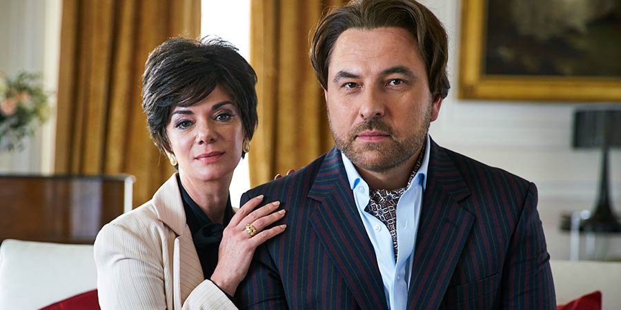 Urban Myths: The Trial Of Joan Collins. Image shows from L to R: Joan Collins (Victoria Hamilton), Monty (David Walliams). Copyright: King Bert Productions. Urban Myths: The Trial Of Joan Collins. Image shows from L to R: Joan Collins (Victoria Hamilton), Monty (David Walliams). Copyright: King Bert Productions.