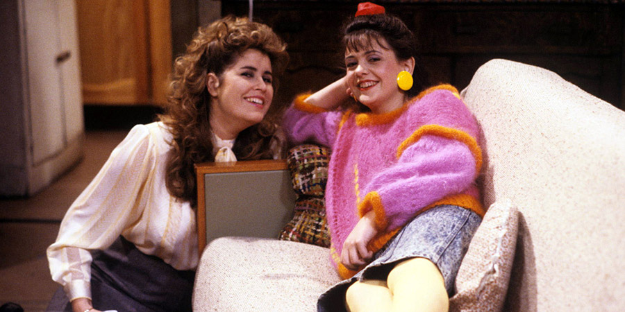 Watching. Image shows from L to R: Pamela Lynch nee Wilson (Liza Tarbuck), Brenda Wilson (Emma Wray). Copyright: Granada Television. Watching. Image shows from L to R: Pamela Lynch nee Wilson (Liza Tarbuck), Brenda Wilson (Emma Wray). Copyright: Granada Television.