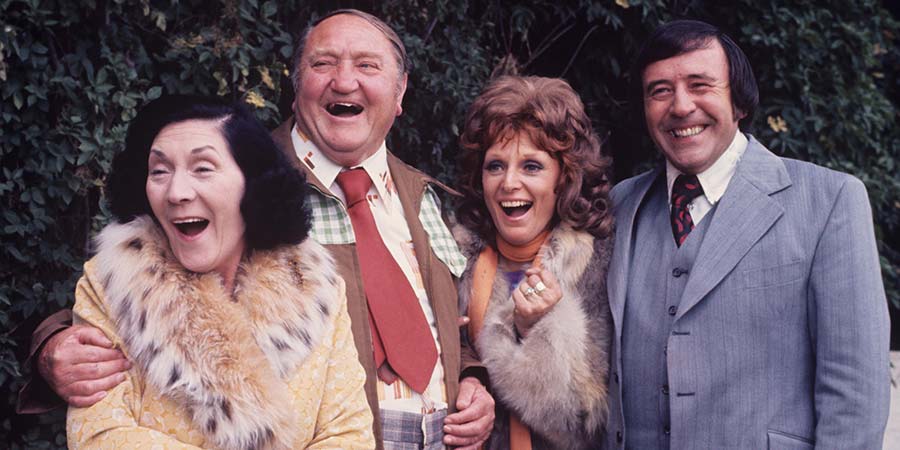 Yus, My Dear. Image shows from L to R: Lil Briggs (Queenie Watts), Wally Briggs (Arthur Mullard), Molly (Valerie Walsh), Benny Briggs (Mike Reid). Copyright: London Weekend Television. Yus, My Dear. Image shows from L to R: Lil Briggs (Queenie Watts), Wally Briggs (Arthur Mullard), Molly (Valerie Walsh), Benny Briggs (Mike Reid). Copyright: London Weekend Television.