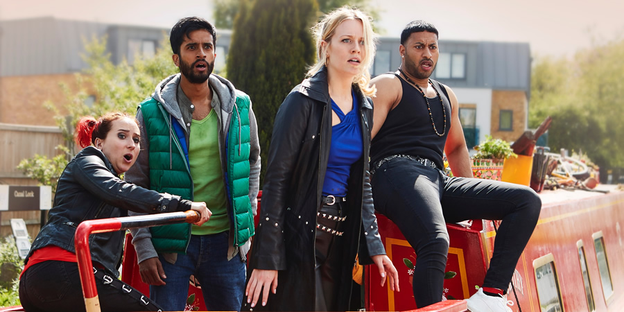 Zomboat!. Image shows from L to R: Kat (Leah Brotherhead), Sunny (Hamza Jeetooa), Jo (Cara Theobold), Amar (Ryan McKen). Copyright: Noho Film and TV. Zomboat!. Image shows from L to R: Kat (Leah Brotherhead), Sunny (Hamza Jeetooa), Jo (Cara Theobold), Amar (Ryan McKen). Copyright: Noho Film and TV.