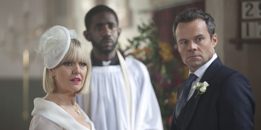 Agatha Raisin. Image shows from L to R: Agatha Raisin (Ashley Jensen), Rev Jez Bloxby (Rhashan Stone), James Lacey (Jamie Glover). Copyright: Mammoth Screen. Agatha Raisin. Image shows from L to R: Agatha Raisin (Ashley Jensen), Rev Jez Bloxby (Rhashan Stone), James Lacey (Jamie Glover). Copyright: Mammoth Screen.