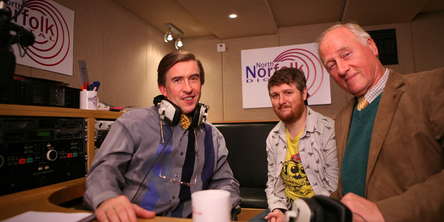Mid Morning Matters With Alan Partridge. Image shows from L to R: Alan Partridge (Steve Coogan), Sidekick Simon (Tim Key), Cecil Croom-Phillips (Nicholas Jones). Copyright: Baby Cow Productions. Mid Morning Matters With Alan Partridge. Image shows from L to R: Alan Partridge (Steve Coogan), Sidekick Simon (Tim Key), Cecil Croom-Phillips (Nicholas Jones). Copyright: Baby Cow Productions.