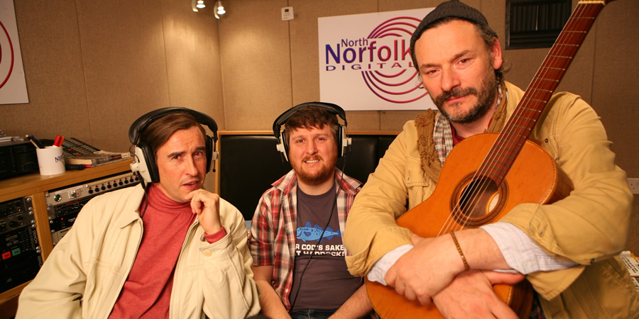 Mid Morning Matters With Alan Partridge. Image shows from L to R: Alan Partridge (Steve Coogan), Sidekick Simon (Tim Key), Blackbird Goodbrooke (Julian Barratt). Copyright: Baby Cow Productions. Mid Morning Matters With Alan Partridge. Image shows from L to R: Alan Partridge (Steve Coogan), Sidekick Simon (Tim Key), Blackbird Goodbrooke (Julian Barratt). Copyright: Baby Cow Productions.