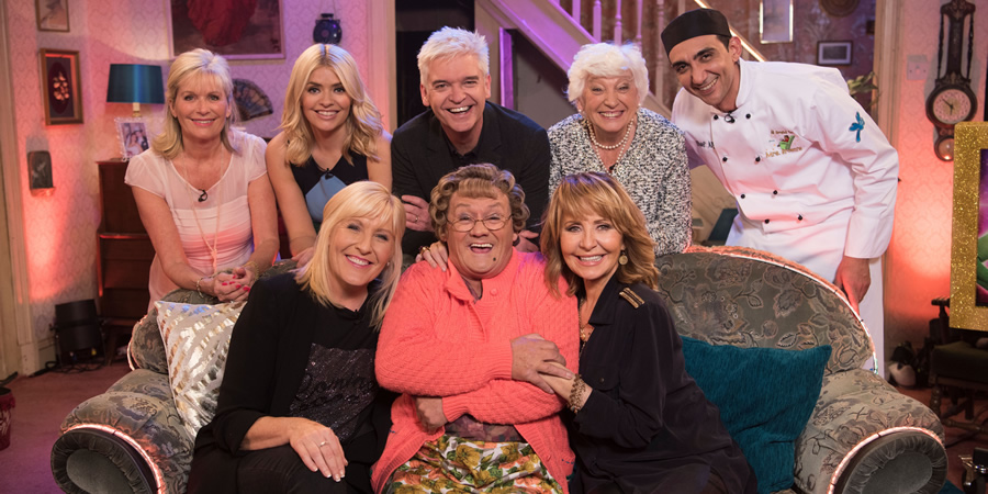 All Round To Mrs. Brown's. Image shows from L to R: Lynne Willoughby, Holly Willoughby, Cathy Brown (Jennifer Gibney), Phillip Schofield, Mrs Brown (Brendan O'Carroll), Lulu, Pat Schofield, Aly Mahmoud. All Round To Mrs. Brown's. Image shows from L to R: Lynne Willoughby, Holly Willoughby, Cathy Brown (Jennifer Gibney), Phillip Schofield, Mrs Brown (Brendan O'Carroll), Lulu, Pat Schofield, Aly Mahmoud.