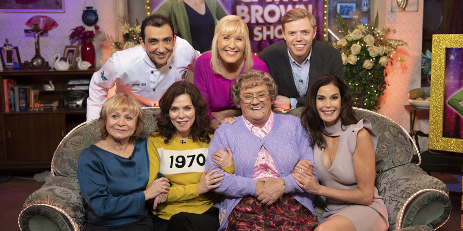 All Round To Mrs. Brown's. Image shows from L to R: Julie Friel, Aly Mahmoud, Anna Friel, Cathy Brown (Jennifer Gibney), Mrs Brown (Brendan O'Carroll), Rob Beckett, Teri Hatcher. All Round To Mrs. Brown's. Image shows from L to R: Julie Friel, Aly Mahmoud, Anna Friel, Cathy Brown (Jennifer Gibney), Mrs Brown (Brendan O'Carroll), Rob Beckett, Teri Hatcher.