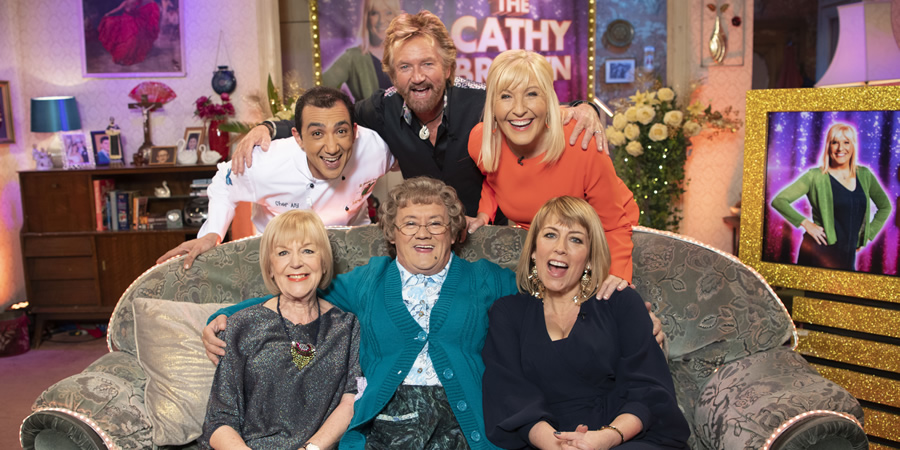 All Round To Mrs. Brown's. Image shows from L to R: Tina Allen, Aly Mahmoud, Noel Edmonds, Mrs Brown (Brendan O'Carroll), Cathy Brown (Jennifer Gibney), Fay Ripley. All Round To Mrs. Brown's. Image shows from L to R: Tina Allen, Aly Mahmoud, Noel Edmonds, Mrs Brown (Brendan O'Carroll), Cathy Brown (Jennifer Gibney), Fay Ripley.