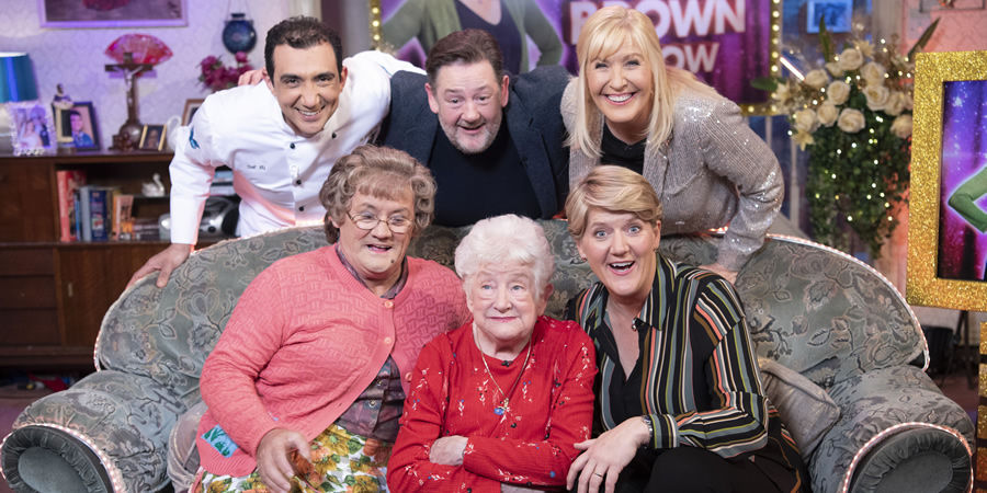 All Round To Mrs. Brown's. Image shows from L to R: Aly Mahmoud, Mrs Brown (Brendan O'Carroll), Johnny Vegas, Patricia Pennington, Clare Balding, Cathy Brown (Jennifer Gibney). All Round To Mrs. Brown's. Image shows from L to R: Aly Mahmoud, Mrs Brown (Brendan O'Carroll), Johnny Vegas, Patricia Pennington, Clare Balding, Cathy Brown (Jennifer Gibney).