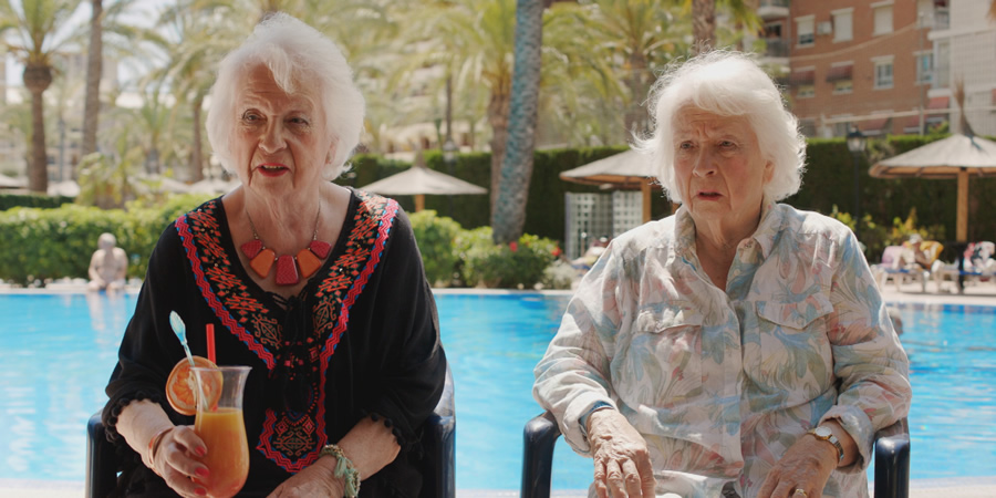 Benidorm. Image shows from L to R: Doreen (Elsie Kelly), Noreen Maltby (Elsie Kelly). Copyright: Tiger Aspect Productions. Benidorm. Image shows from L to R: Doreen (Elsie Kelly), Noreen Maltby (Elsie Kelly). Copyright: Tiger Aspect Productions.