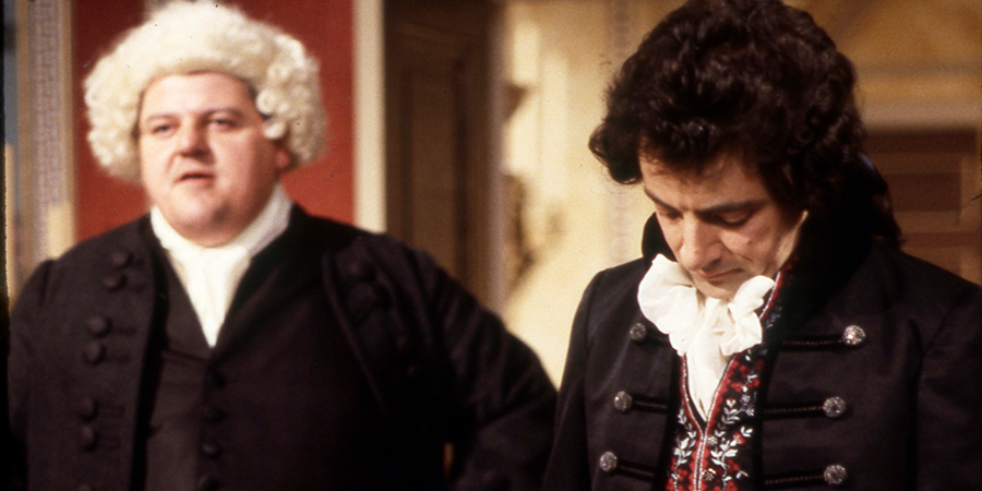 Blackadder. Image shows from L to R: Dr. Samuel Johnson (Robbie Coltrane), Mr. Edmund Blackadder, Esquire (Rowan Atkinson). Blackadder. Image shows from L to R: Dr. Samuel Johnson (Robbie Coltrane), Mr. Edmund Blackadder, Esquire (Rowan Atkinson).