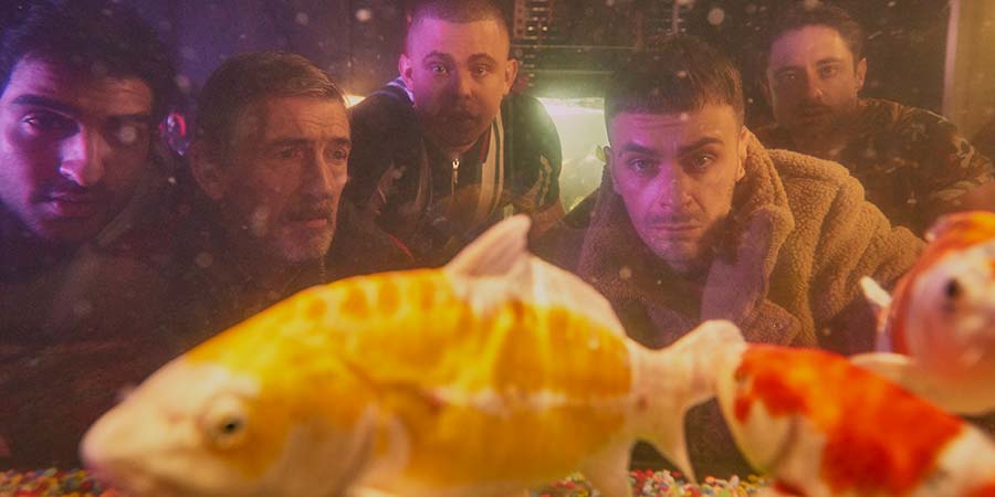 Brassic. Image shows from L to R: JJ (Parth Thakerar), Fish Buyer (Glenn Cunningham), Ash (Aaron Heffernan), Vinnie (Joe Gilgun), Tommo (Ryan Sampson). Copyright: Calamity Films. Brassic. Image shows from L to R: JJ (Parth Thakerar), Fish Buyer (Glenn Cunningham), Ash (Aaron Heffernan), Vinnie (Joe Gilgun), Tommo (Ryan Sampson). Copyright: Calamity Films.