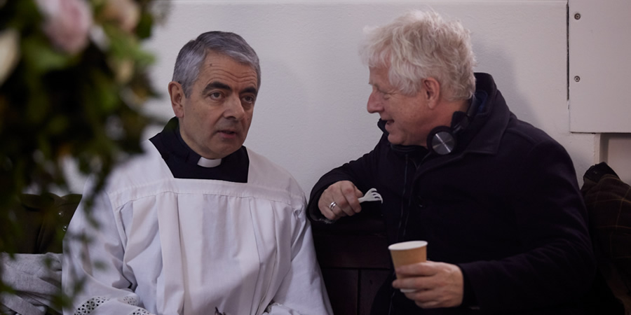 Comic Relief. Image shows from L to R: Father Gerald (Rowan Atkinson), Richard Curtis. Copyright: BBC. Comic Relief. Image shows from L to R: Father Gerald (Rowan Atkinson), Richard Curtis. Copyright: BBC.