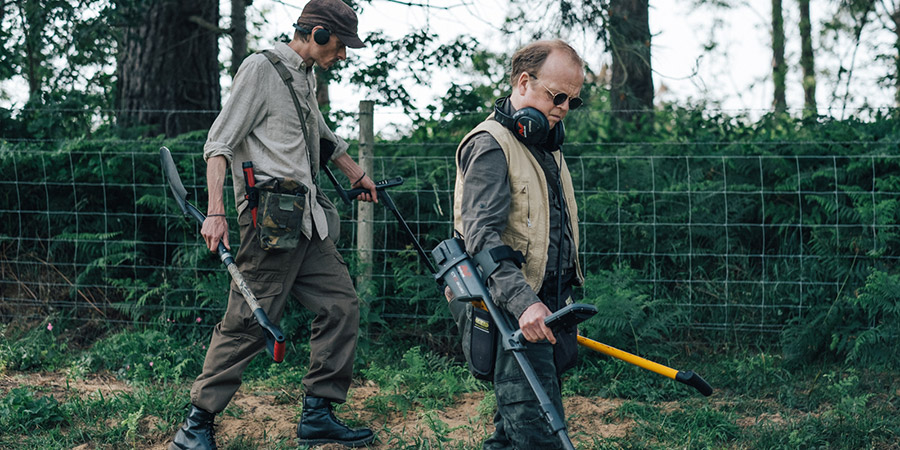 Detectorists. Image shows from L to R: Andy Stone (Mackenzie Crook), Lance Stater (Toby Jones). Copyright: BBC. Detectorists. Image shows from L to R: Andy Stone (Mackenzie Crook), Lance Stater (Toby Jones). Copyright: BBC.