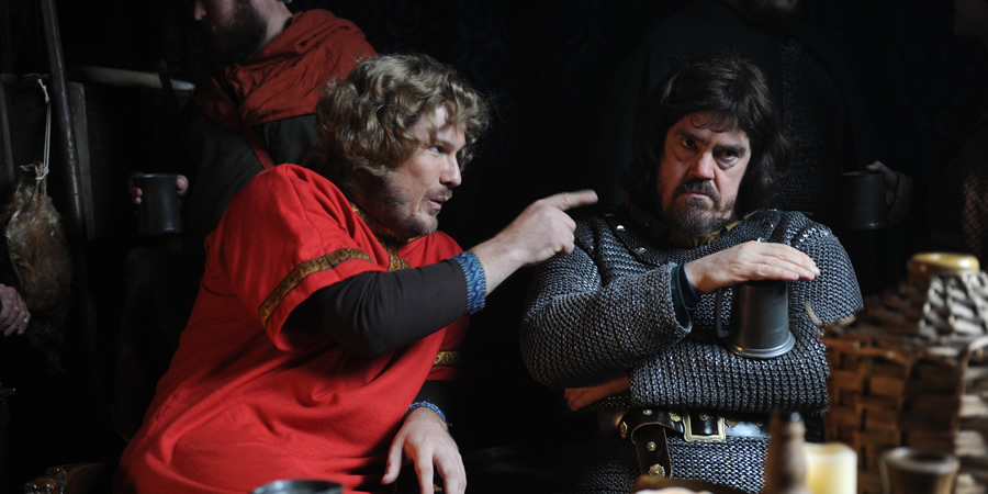 Drunk History. Image shows from L to R: Harold Godwinson (Marc Wootton), William The Bastard (Phill Jupitus). Copyright: Tiger Aspect Productions. Drunk History. Image shows from L to R: Harold Godwinson (Marc Wootton), William The Bastard (Phill Jupitus). Copyright: Tiger Aspect Productions.