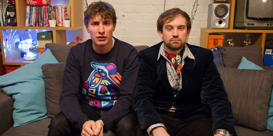Flat TV. Image shows from L to R: Tom (Tom Rosenthal), Naz (Naz Osmanoglu). Copyright: BBC. Flat TV. Image shows from L to R: Tom (Tom Rosenthal), Naz (Naz Osmanoglu). Copyright: BBC.