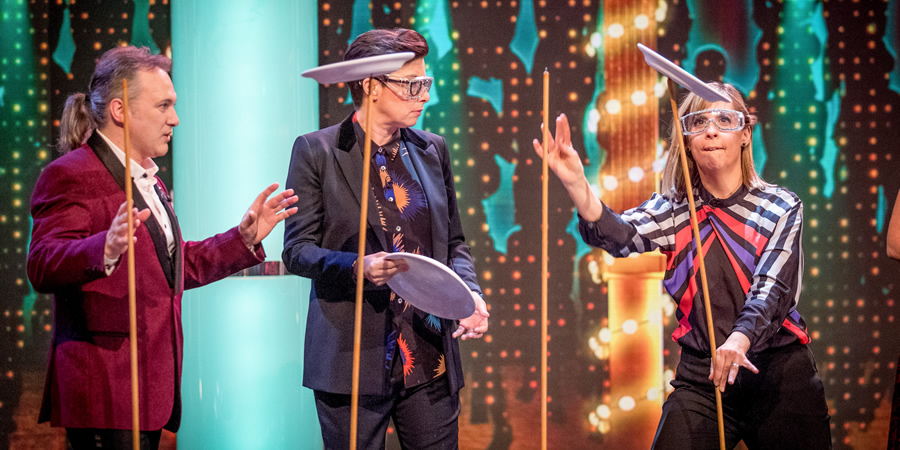 The Generation Game. Image shows from L to R: Andrew Van Buren, Sue Perkins, Mel Giedroyc. Copyright: BBC. The Generation Game. Image shows from L to R: Andrew Van Buren, Sue Perkins, Mel Giedroyc. Copyright: BBC.