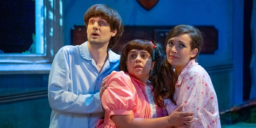The Goes Wrong Show. Image shows from L to R: Chris (Henry Shields), Annie (Nancy Zamit), Vanessa (Bryony Corrigan). The Goes Wrong Show. Image shows from L to R: Chris (Henry Shields), Annie (Nancy Zamit), Vanessa (Bryony Corrigan).
