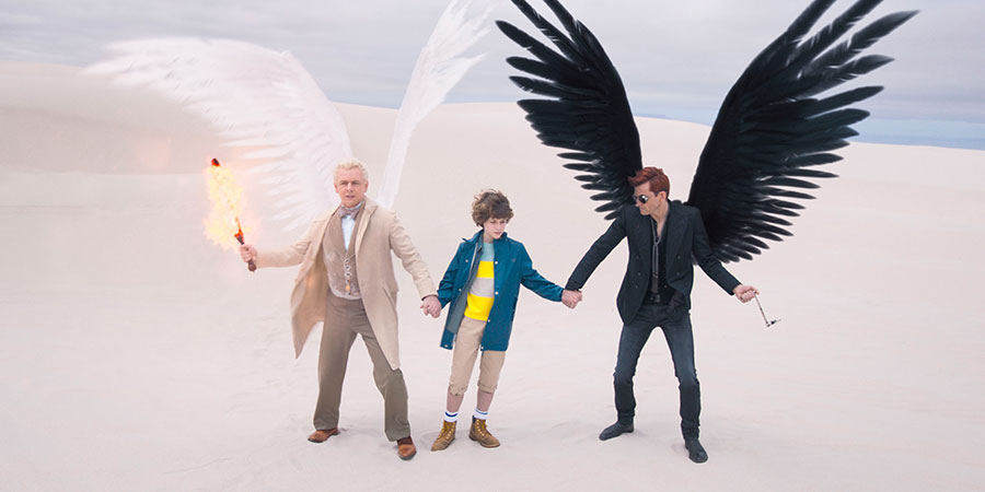 Good Omens. Image shows from L to R: Aziraphale (Michael Sheen), Adam Young (Sam Taylor Buck), Crowley (David Tennant). Good Omens. Image shows from L to R: Aziraphale (Michael Sheen), Adam Young (Sam Taylor Buck), Crowley (David Tennant).
