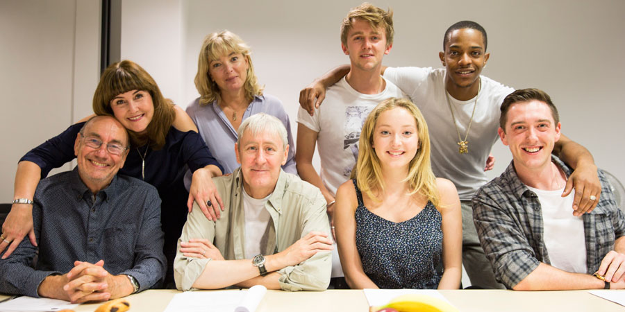Goodnight Sweetheart. Image shows from L to R: PC Reg Deadman (Christopher Ettridge), Phoebe Sparrow (Elizabeth Carling), Yvonne Sparrow (Emma Amos), Gary Sparrow (Nicholas Lyndhurst), Michael Sparrow (Tim Preston), Ellie (Esme Coy), Phone Shop Salesman Kyle (Khali Best), George Sparrow (Liam Jeavons). Copyright: Retort. Goodnight Sweetheart. Image shows from L to R: PC Reg Deadman (Christopher Ettridge), Phoebe Sparrow (Elizabeth Carling), Yvonne Sparrow (Emma Amos), Gary Sparrow (Nicholas Lyndhurst), Michael Sparrow (Tim Preston), Ellie (Esme Coy), Phone Shop Salesman Kyle (Khali Best), George Sparrow (Liam Jeavons). Copyright: Retort.