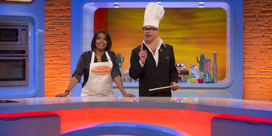 Harry Hill's Tea Time. Image shows from L to R: Sunetra Sarker, Harry Hill. Copyright: Nit TV. Harry Hill's Tea Time. Image shows from L to R: Sunetra Sarker, Harry Hill. Copyright: Nit TV.