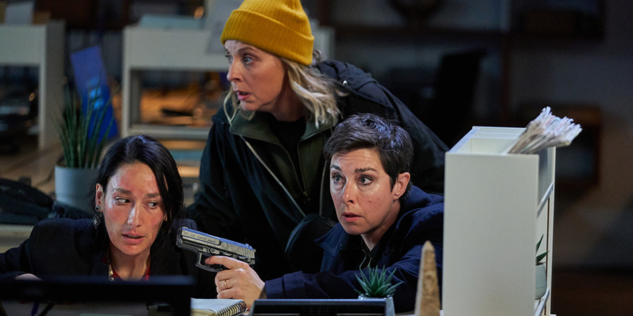 Hitmen. Image shows from L to R: The Accountant (Sian Clifford), Jamie (Mel Giedroyc), Fran (Sue Perkins). Copyright: Tiger Aspect Productions. Hitmen. Image shows from L to R: The Accountant (Sian Clifford), Jamie (Mel Giedroyc), Fran (Sue Perkins). Copyright: Tiger Aspect Productions.