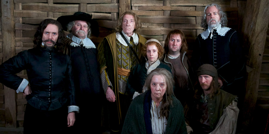 Inside No. 9. Image shows from L to R: Mr Warren (Reece Shearsmith), George Waterhouse (Trevor Cooper), Sir Andrew Pike (David Warner), Sarah Nutter (Sinead Matthews), Elizabeth Gadge (Ruth Sheen), Thomas Nutter (Jim Howick), Richard Two-Shoes (Paul Kaye), Mr Clarke (Steve Pemberton). Copyright: BBC. Inside No. 9. Image shows from L to R: Mr Warren (Reece Shearsmith), George Waterhouse (Trevor Cooper), Sir Andrew Pike (David Warner), Sarah Nutter (Sinead Matthews), Elizabeth Gadge (Ruth Sheen), Thomas Nutter (Jim Howick), Richard Two-Shoes (Paul Kaye), Mr Clarke (Steve Pemberton). Copyright: BBC.