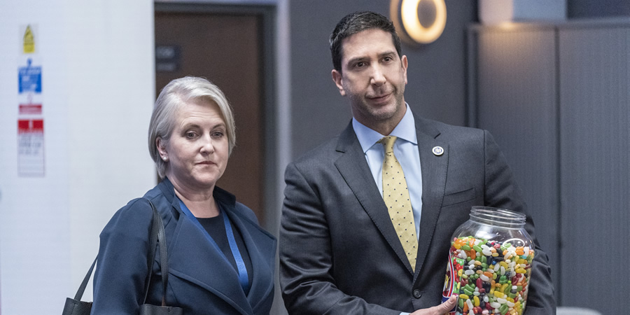 Intelligence. Image shows from L to R: Christine Clark (Sylvestra Le Touzel), Jerry Bernstein (David Schwimmer). Intelligence. Image shows from L to R: Christine Clark (Sylvestra Le Touzel), Jerry Bernstein (David Schwimmer).