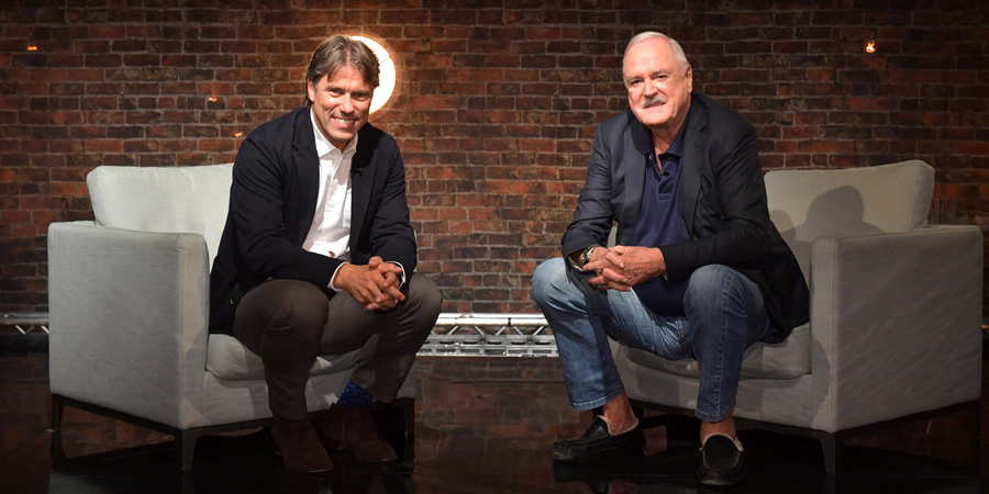 John Bishop In Conversation With.... Image shows from L to R: John Bishop, John Cleese. Copyright: Lola Entertainment. John Bishop In Conversation With.... Image shows from L to R: John Bishop, John Cleese. Copyright: Lola Entertainment.