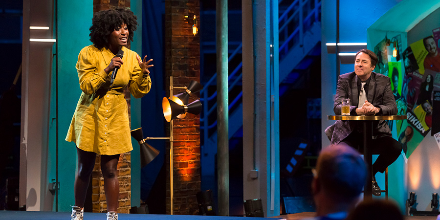Jonathan Ross' Comedy Club. Image shows from L to R: Sophie Duker, Jonathan Ross. Copyright: Hot Sauce. Jonathan Ross' Comedy Club. Image shows from L to R: Sophie Duker, Jonathan Ross. Copyright: Hot Sauce.