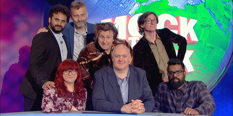 Mock The Week. Image shows from L to R: Nish Kumar, Angela Barnes, Hugh Dennis, Milton Jones, Dara O Briain, Ed Byrne, Romesh Ranganathan. Copyright: Angst Productions. Mock The Week. Image shows from L to R: Nish Kumar, Angela Barnes, Hugh Dennis, Milton Jones, Dara O Briain, Ed Byrne, Romesh Ranganathan. Copyright: Angst Productions.