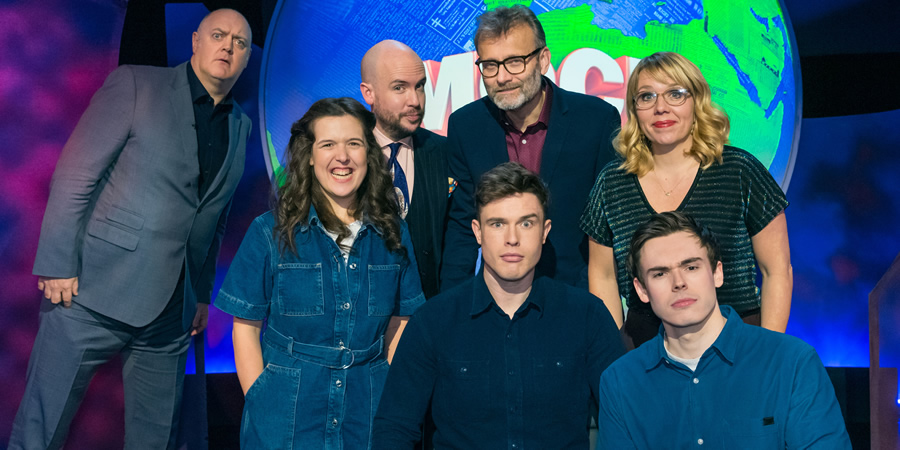 Mock The Week. Image shows from L to R: Dara O Briain, Rosie Jones, Tom Allen, Hugh Dennis, Ed Gamble, Kerry Godliman, Rhys James. Copyright: Angst Productions. Mock The Week. Image shows from L to R: Dara O Briain, Rosie Jones, Tom Allen, Hugh Dennis, Ed Gamble, Kerry Godliman, Rhys James. Copyright: Angst Productions.