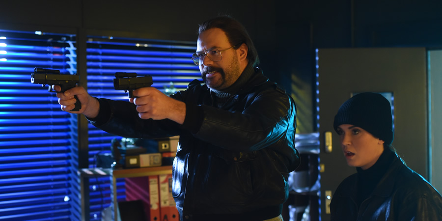 Murder In Successville. Image shows from L to R: DI Sleet (Tom Davis), Vicky Pattison. Copyright: Tiger Aspect Productions. Murder In Successville. Image shows from L to R: DI Sleet (Tom Davis), Vicky Pattison. Copyright: Tiger Aspect Productions.