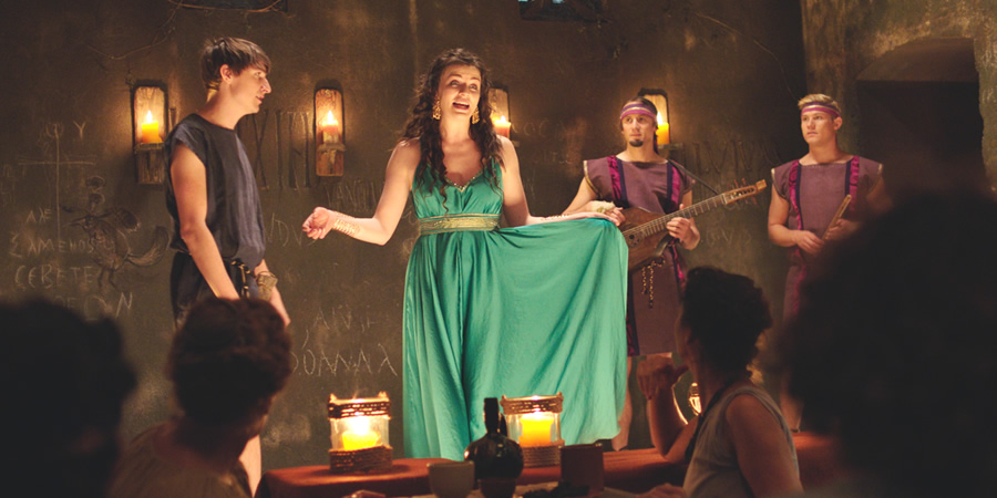 Plebs. Image shows from L to R: Marcus (Tom Rosenthal), Minerva (Aisling Bea), Aurelius (Tom Basden), Jason (Jon Pointing). Copyright: RISE Films. Plebs. Image shows from L to R: Marcus (Tom Rosenthal), Minerva (Aisling Bea), Aurelius (Tom Basden), Jason (Jon Pointing). Copyright: RISE Films.