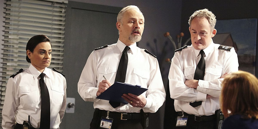 Porridge. Image shows from L to R: Officer Driscoll (Amina Zia), Officer Meekie (Mark Bonnar), Officer Braithwaite (Dominic Coleman). Copyright: BBC. Porridge. Image shows from L to R: Officer Driscoll (Amina Zia), Officer Meekie (Mark Bonnar), Officer Braithwaite (Dominic Coleman). Copyright: BBC.