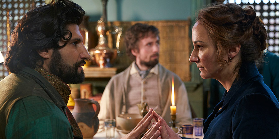 Quacks. Image shows from L to R: Mr Kapoor (Kayvan Novak), John (Tom Basden), Caroline (Lydia Leonard). Copyright: Lucky Giant. Quacks. Image shows from L to R: Mr Kapoor (Kayvan Novak), John (Tom Basden), Caroline (Lydia Leonard). Copyright: Lucky Giant.