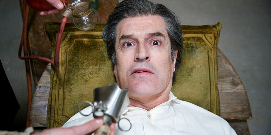 Quacks. Dr. Hendrick (Rupert Everett). Copyright: Lucky Giant. Quacks. Dr. Hendrick (Rupert Everett). Copyright: Lucky Giant.