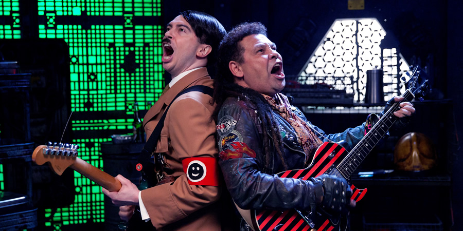 Red Dwarf. Image shows from L to R: Hitler (Ryan Gage), Lister (Craig Charles).