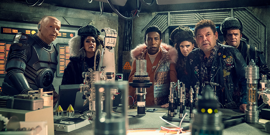 Red Dwarf. Image shows from L to R: Kryten (Robert Llewellyn), Sister Luna (Mandeep Dhillon), Cat (Danny John-Jules), Sister Peanut (Lucy Pearman), Lister (Craig Charles), Brother Sol (Tom Bennett). Red Dwarf. Image shows from L to R: Kryten (Robert Llewellyn), Sister Luna (Mandeep Dhillon), Cat (Danny John-Jules), Sister Peanut (Lucy Pearman), Lister (Craig Charles), Brother Sol (Tom Bennett).