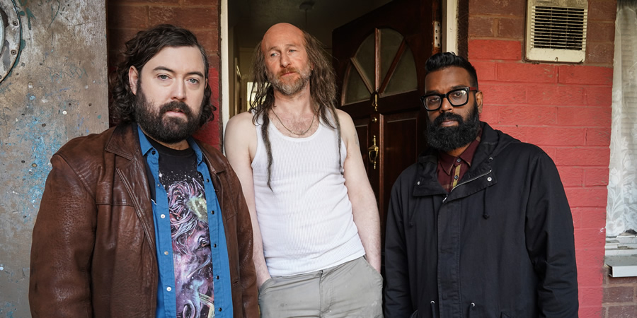 The Reluctant Landlord. Image shows from L to R: Lemon (Nick Helm), Dreadlock Jeff (Paul Kaye), Romesh (Romesh Ranganathan). Copyright: What Larks Productions. The Reluctant Landlord. Image shows from L to R: Lemon (Nick Helm), Dreadlock Jeff (Paul Kaye), Romesh (Romesh Ranganathan). Copyright: What Larks Productions.