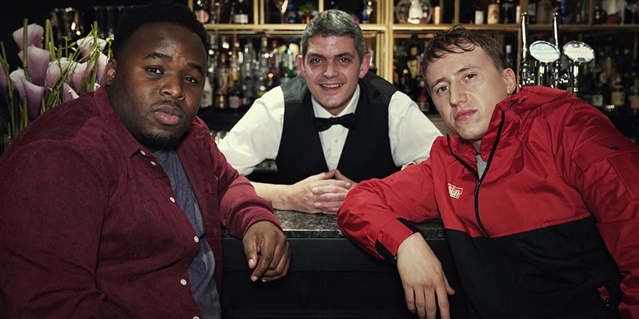 Sliced. Image shows from L to R: Joshua (Samson Kayo), Merlin Griffiths, Ricky (Theo Barklem-Biggs). Copyright: Lovely Electricity. Sliced. Image shows from L to R: Joshua (Samson Kayo), Merlin Griffiths, Ricky (Theo Barklem-Biggs). Copyright: Lovely Electricity.